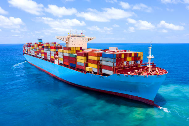 Ultra large Container Ship loaded to the top at Sea, Aerial image